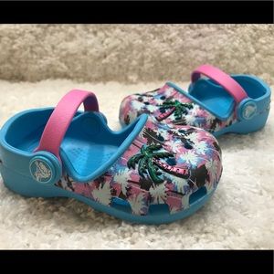 Blue and Pink Crocs